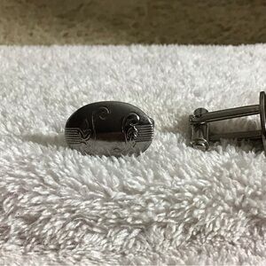 Polished Silver Oval Cufflinks with Scroll Detailing